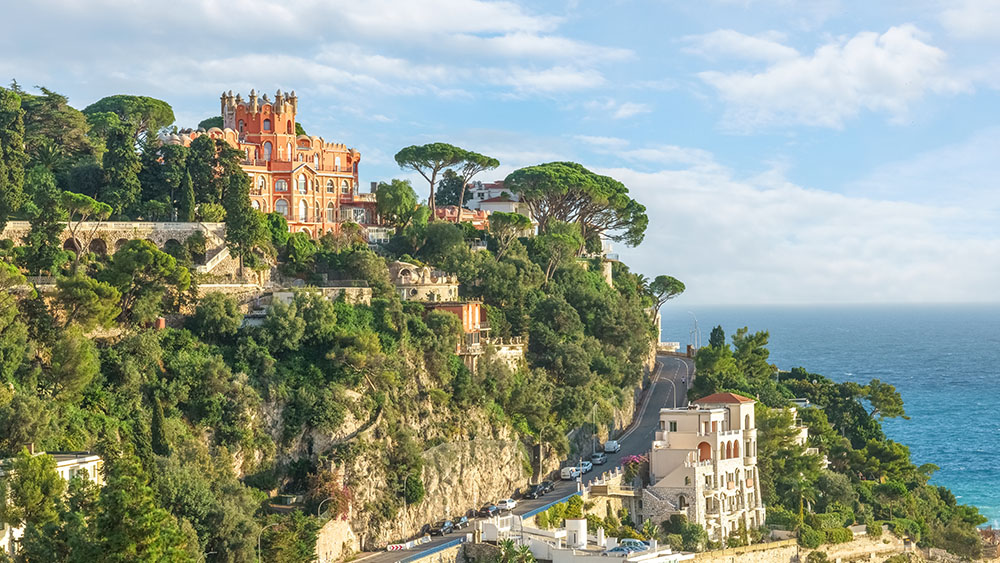 French Riviera, green hill and azure Mediterranean sea.